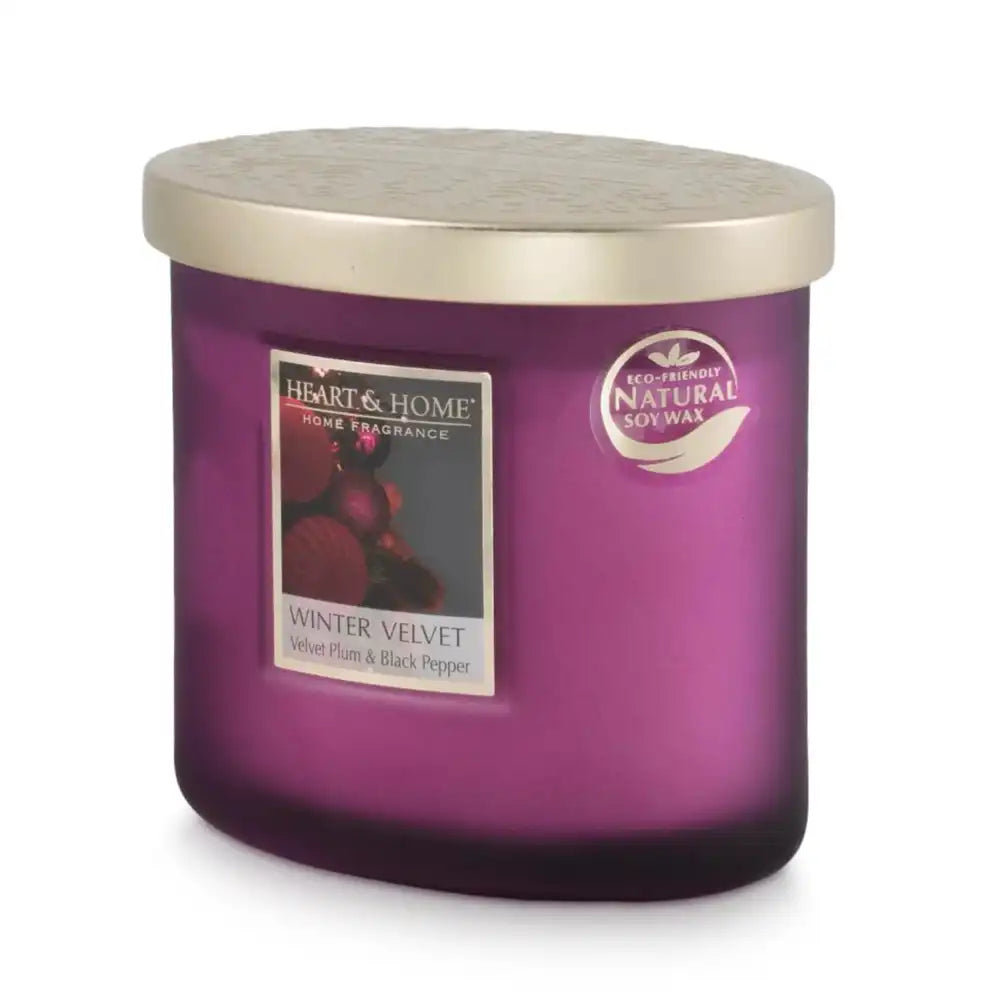 Heart & Home Winter Velvet scented soy wax candle in a purple glass jar with a metallic gold lid, shown on a white background.