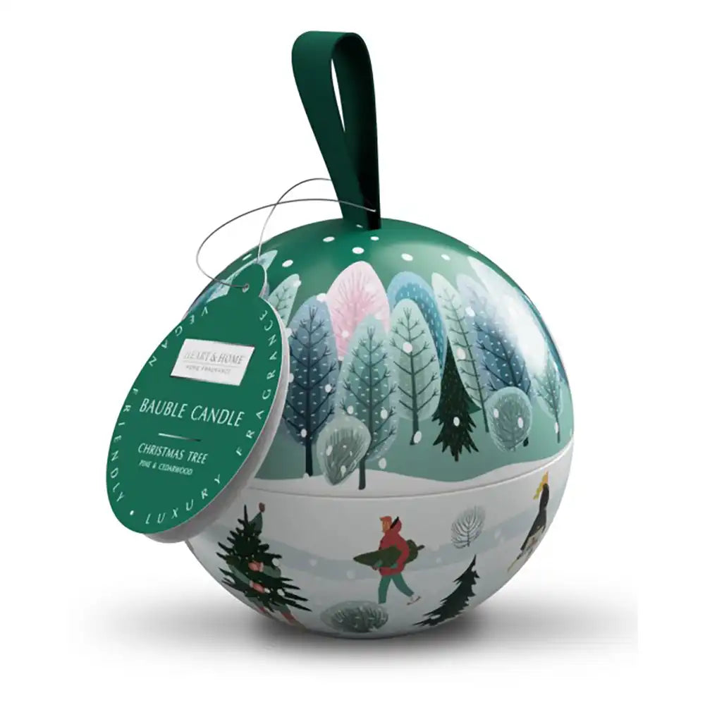 Decorative Christmas ball candle with a forest design on a white background
