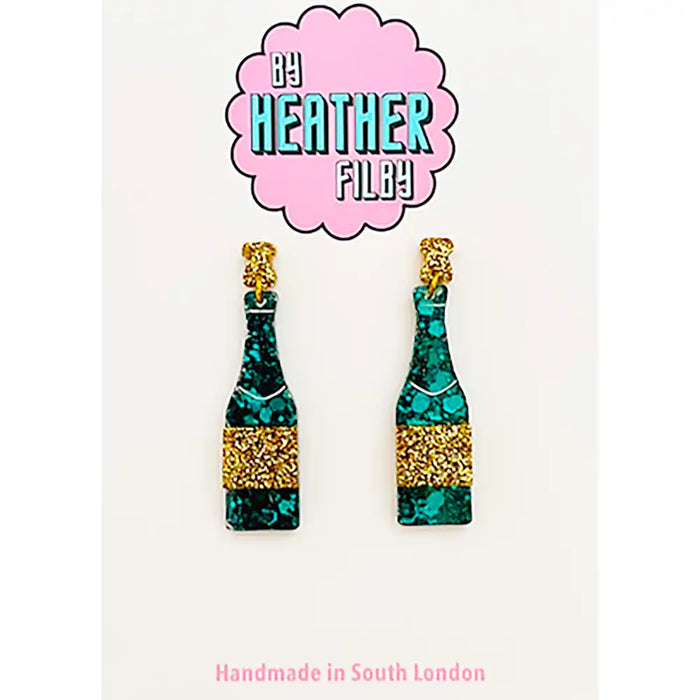 Teal and gold bottle-shaped earrings with 'By Heather Filby' branding on a white background.