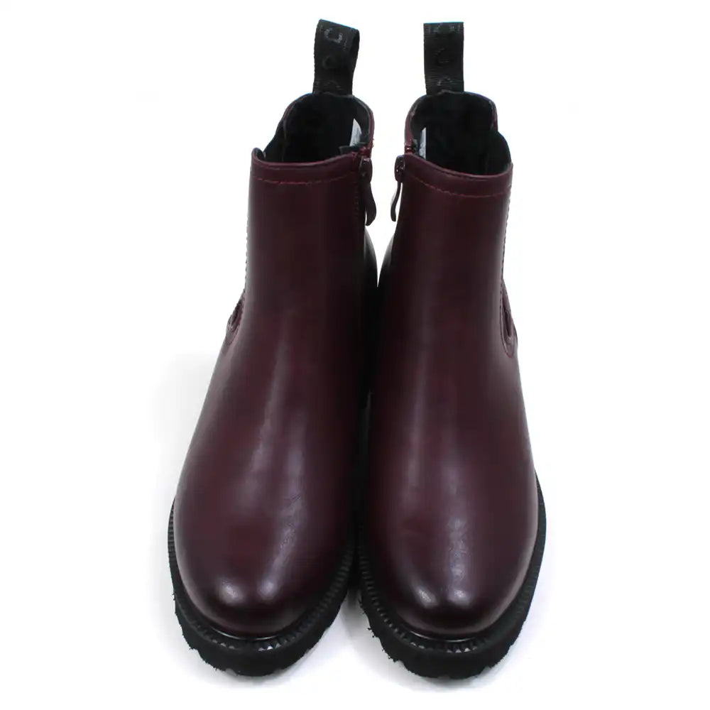 Front view of a pair of plum leather look Chelsea boots with an almond shaped toe on a white background