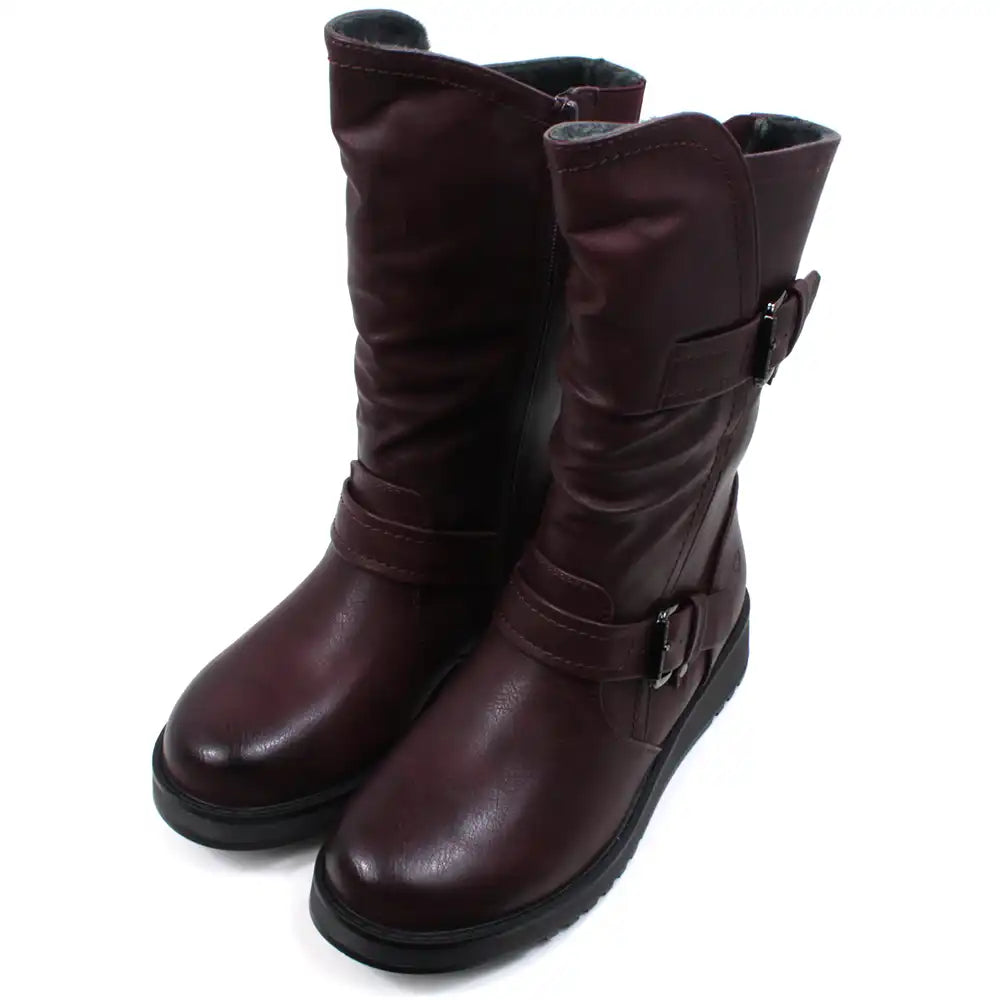 Burgundy calf height boots with buckles at the ankle and on the leg. Low heels. Angled view.