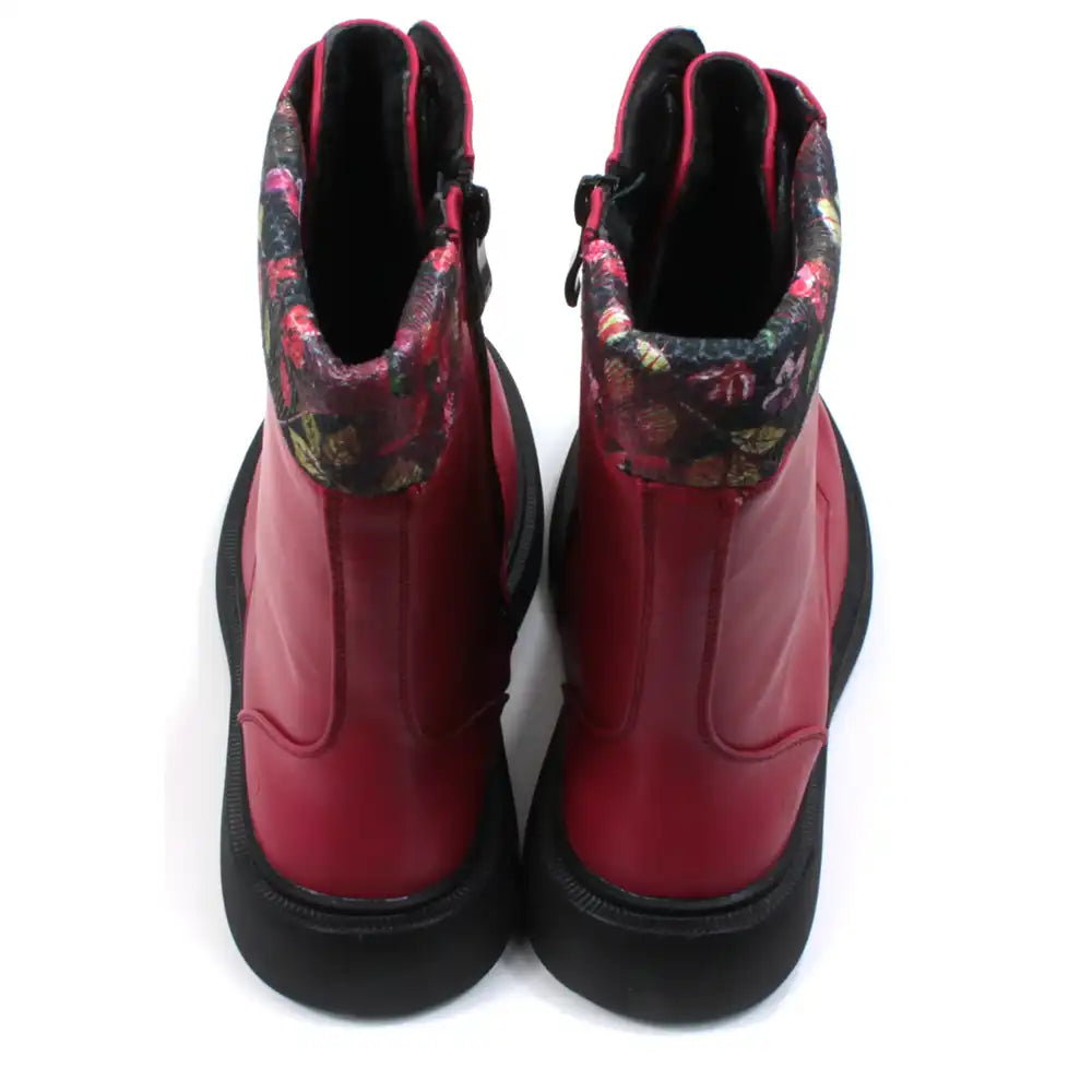 Bold red 10 lace boots with zip up fitting. Black low soles. Leaves fabric trim around cuffs. Back view.