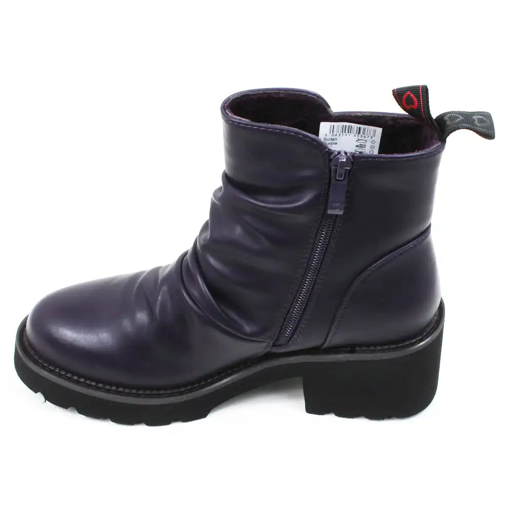 Purple ankle boots. Low black rubber heels. View showing zip for fitting.