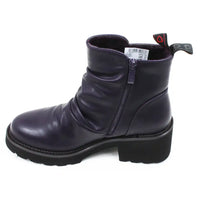 Purple ankle boots. Low black rubber heels. View showing zip for fitting.