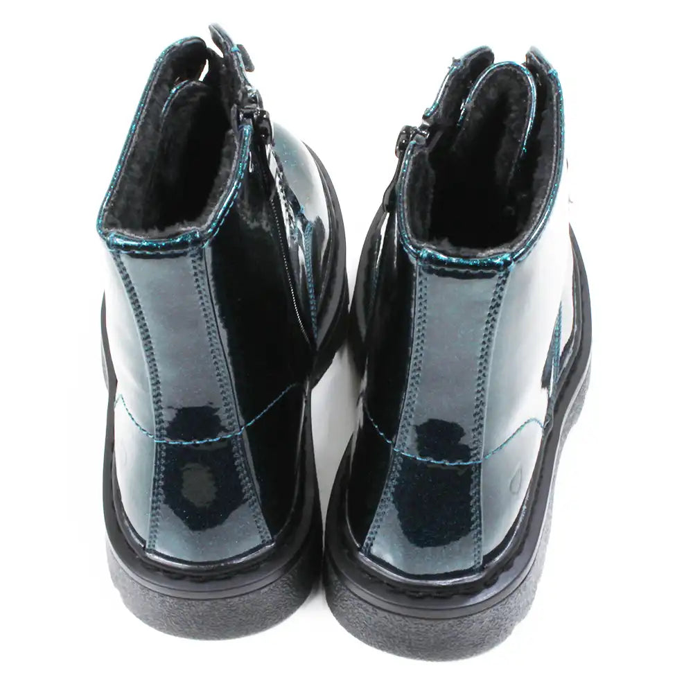 Pair of blue glittery combat style boots with black laces. Back view.
