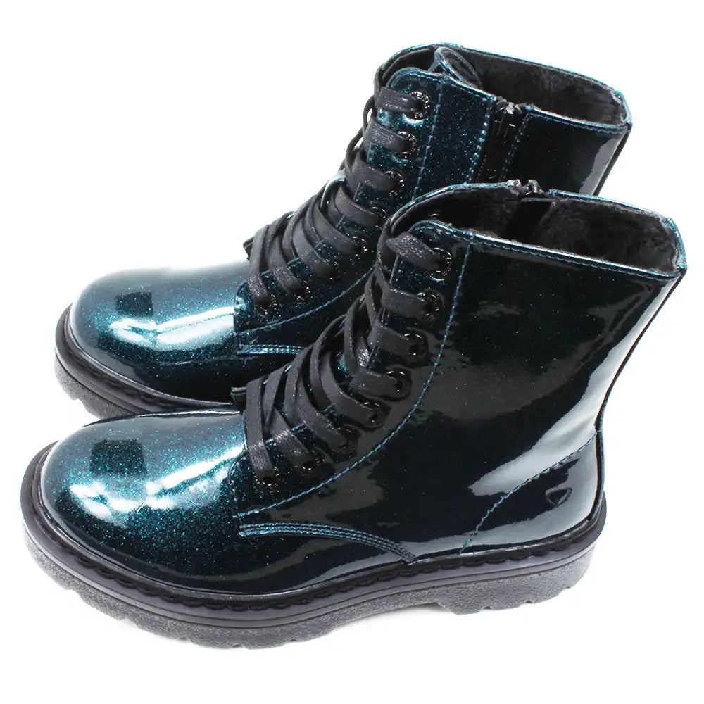 Pair of blue glittery combat style boots with black laces. Side view.
