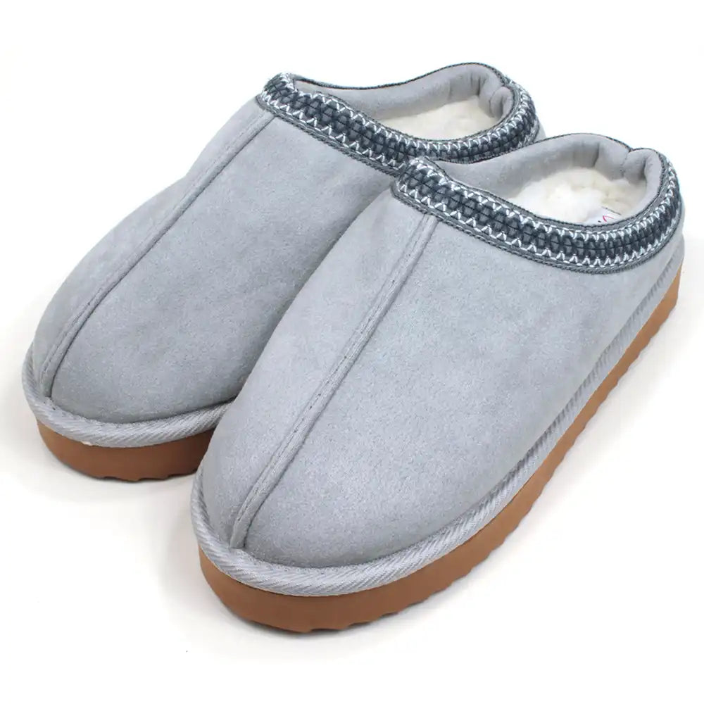 Heavenly Feet Frances grey coloured suede look open back clogs on white platform soles. Fleece insides and decorative stitched border details. Angled view.