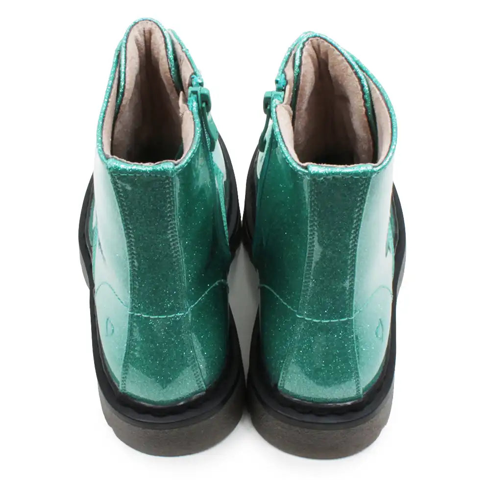 Mint green glittery combat boots.