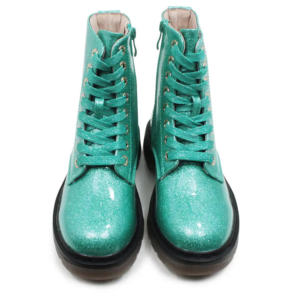 Mint green glittery combat boots.