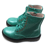 Mint green glittery combat boots.
