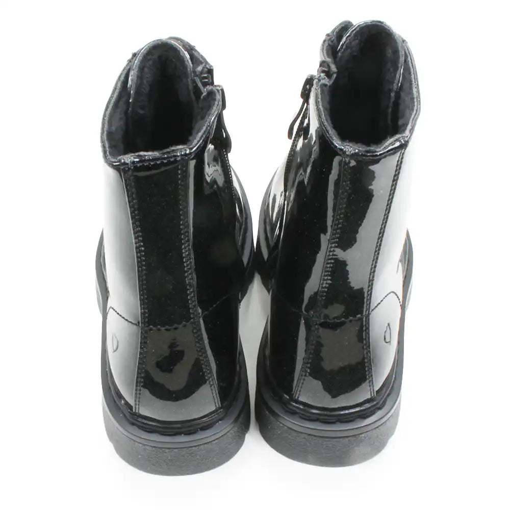 A pair of black patent leather ankle boots shown from the back, featuring a glossy finish and thick black soles, set against a plain white background.