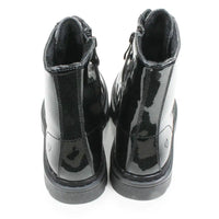 A pair of black patent leather ankle boots shown from the back, featuring a glossy finish and thick black soles, set against a plain white background.
