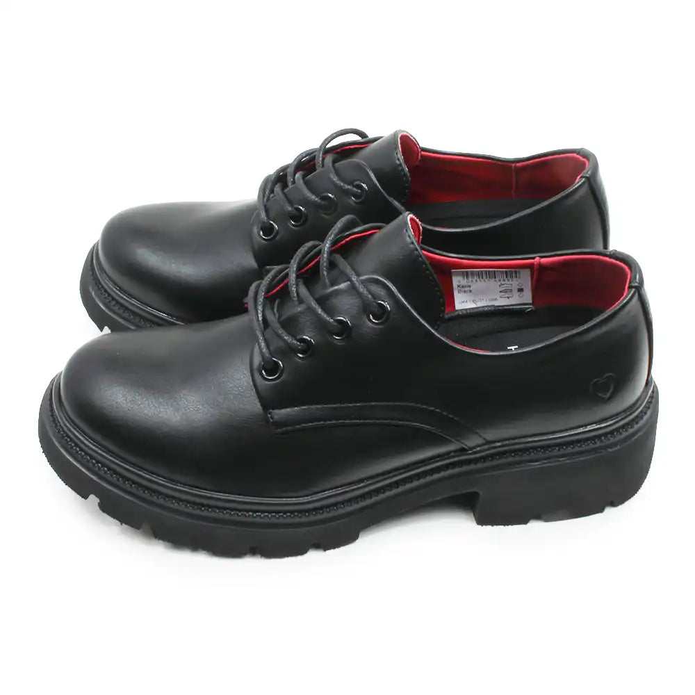 A pair of black leather lace-up shoes with a chunky lug sole and a bright red interior lining, shown against a plain white background.