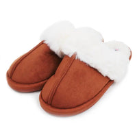 Heavenly Feet white faux fur trimmed and lined mule slippers in suede effect chestnut brown fabric. Angled view.