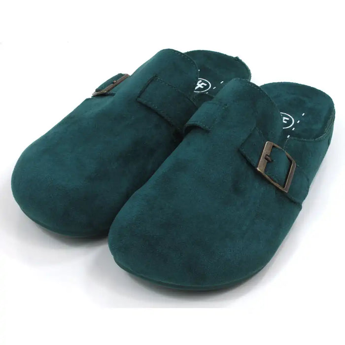 Pair of green slippers with buckles on a white background