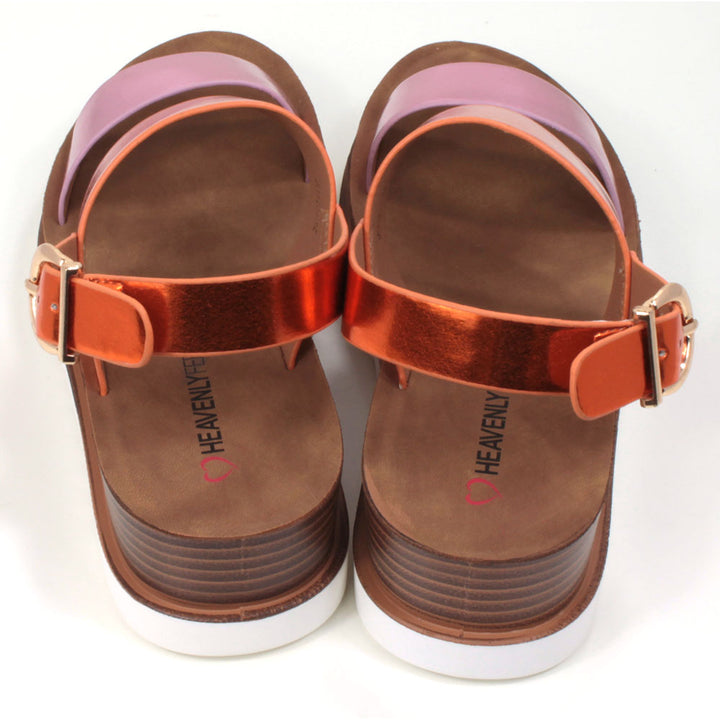 Pink and orange metallic effect sandals with buckled ankle strap. Two wide over the foot straps. Tan coloured footbed. White rubber soles. Back view