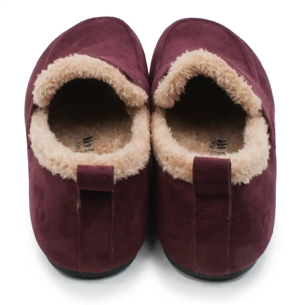 A pair of women's slip-on slippers in deep burgundy suede with a soft beige sherpa lining, shown from a top-down view on a white background.