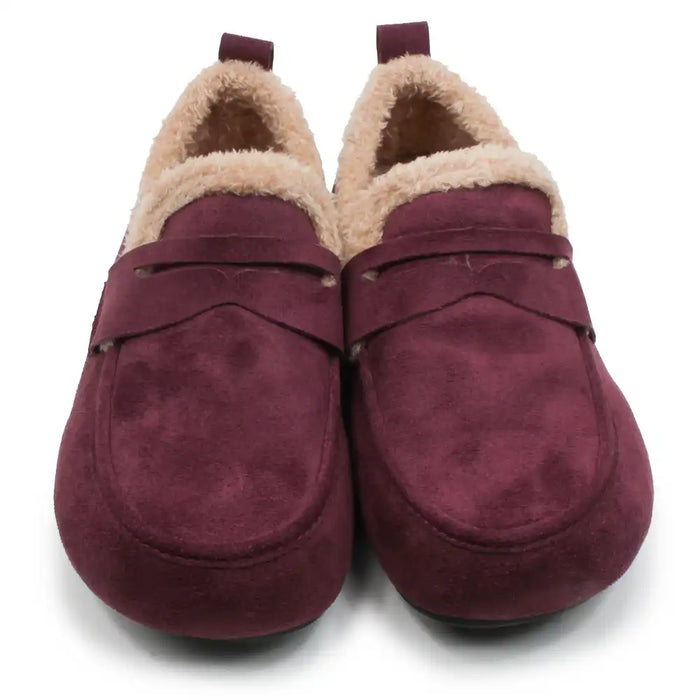 A pair of women's slip-on slippers in burgundy suede with a plush beige sherpa lining, shown against a plain white background.