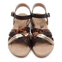 Wedge sandals with gold, brown and animal print straps.
