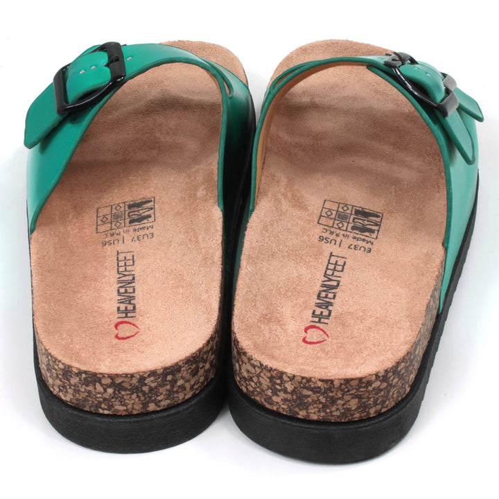 Metallic effect jade green double strap open backed sandals. Adjustments by black buckles. Cork effect, sculpted soles and footbeds. Back view. 