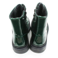 A pair of glossy dark glittery green ankle boots with black soles and black interior lining, shown from the back on a white background.