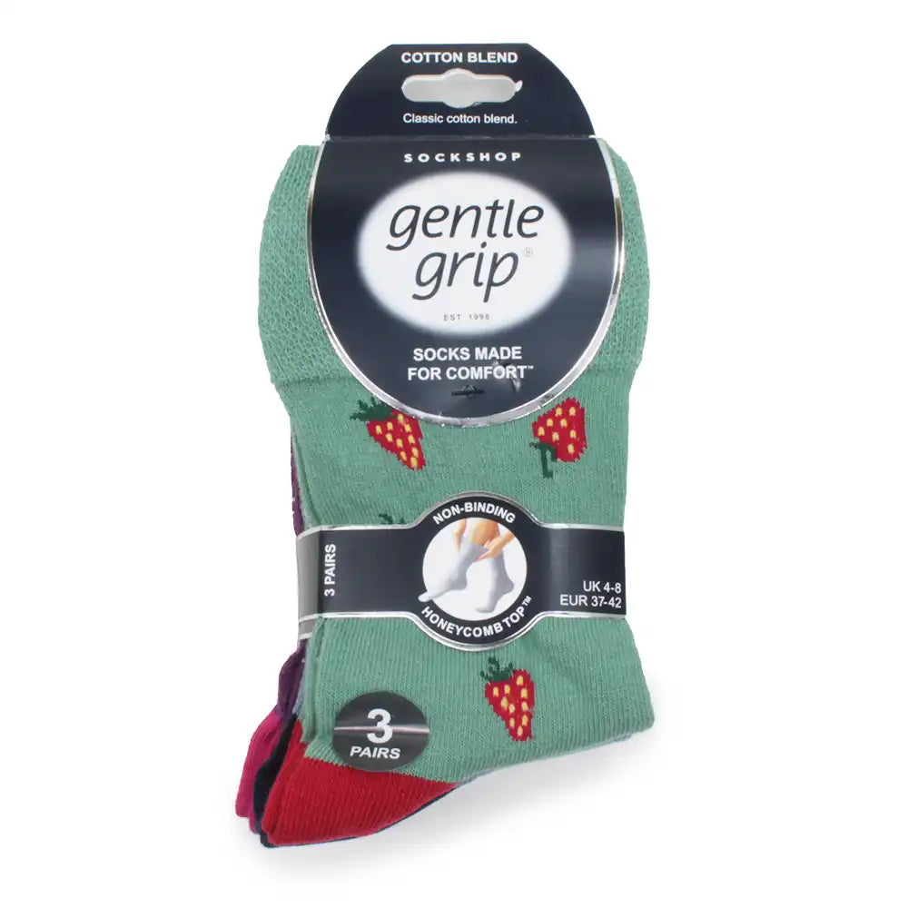 Pack of socks with strawberry pattern and 'gentle grip' packaging on a white background