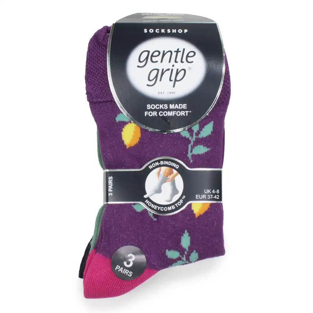 Pack of purple socks with lemon patterns and 'gentle grip' packaging on a white background