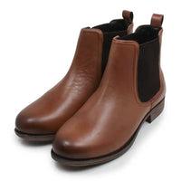 A pair of women's brown leather Chelsea boots with black elastic side panels, shown on a clean white background.