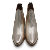 A pair of metallic taupe leather Chelsea boots shown from a top-down view on a white background.