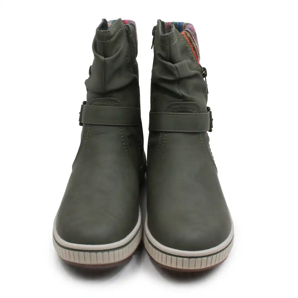 A pair of women's mid-calf boots in olive green, featuring a buckle strap across the instep, a side zipper, and a thick white and gray striped sole.
