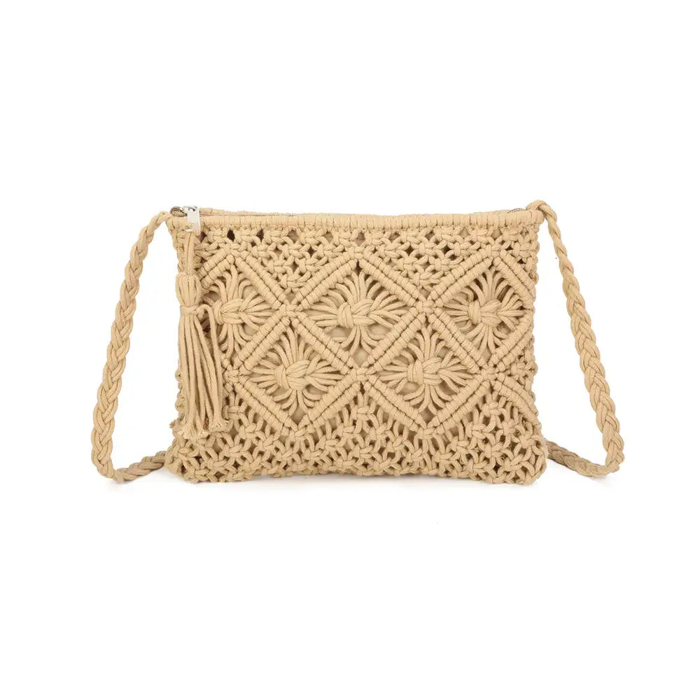 A natural beige macrame shoulder bag with a woven geometric pattern, braided strap, and tassel detail, shown against a plain white background.