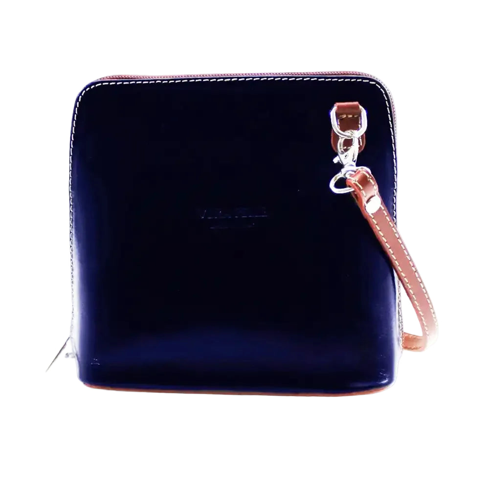 A navy blue leather zip-around wallet with a matching strap and silver-tone hardware, shown on a plain white background.
