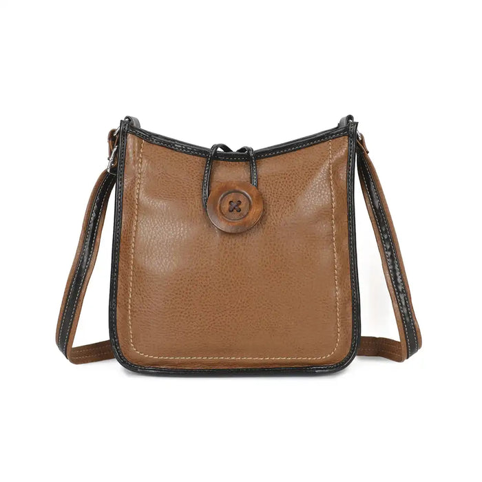 A brown pebbled leather crossbody bag with black trim and a brown button closure on the front, shown against a plain white background.