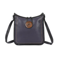 A dark navy blue pebbled leather crossbody bag with a prominent round wooden button closure on the front and light-colored contrast stitching, shown against a plain white background.
