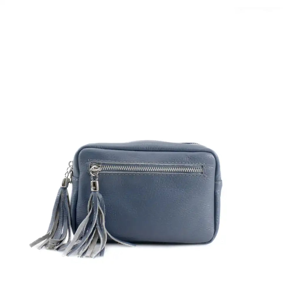 Landscape leather bag in blue with a zip pocket on the front and top. Zips have silver hardware with a tassel tab. 