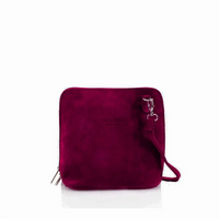 Purple crossbody bag with a visible brand logo on a white background