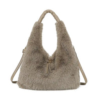 A taupe faux fur hobo shoulder bag with a matching faux fur handle and a thin shoulder strap, shown against a plain white background.
