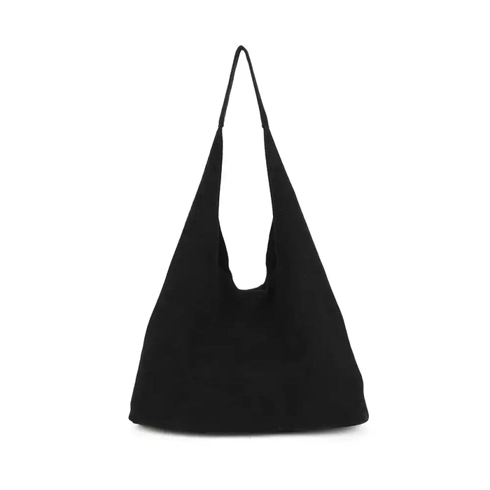 A black suede hobo shoulder bag with a single strap, photographed against a plain white background.