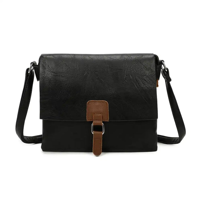 Black leather crossbody bag with brown accents on a white background