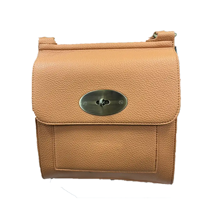 A tan pebbled leather shoulder bag with a silver-tone oval turn-lock closure on the front flap, shown against a plain white background.