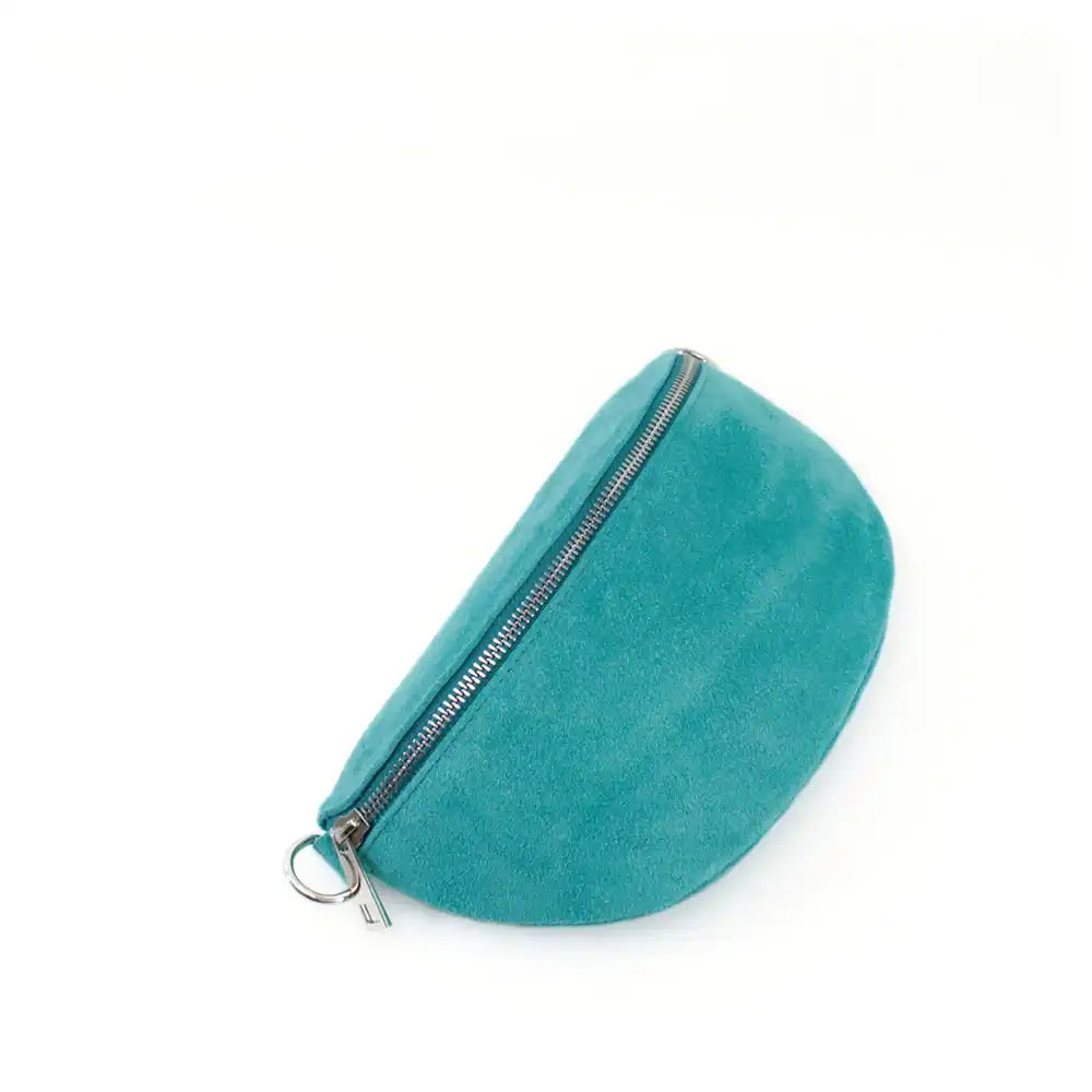 Half moon shaped bag in a suede turquoise. Zip fastening over the top with silver hardware. 