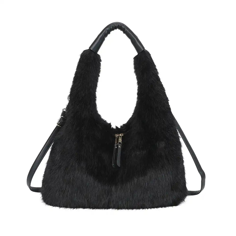 Black faux fur shoulder bag with black leather look handles and a front zipper, shown on a plain white background.