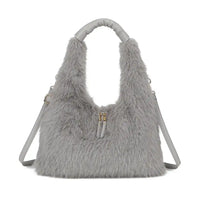 A light grey faux fur shoulder bag with a matching grey top handle and shoulder strap, featuring a small gold zipper pull accent on the front.