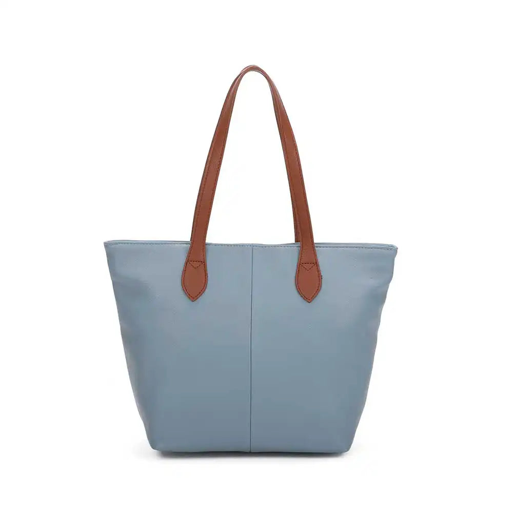 Blue tote bag with brown handles on a white background