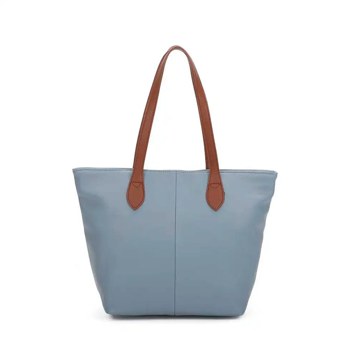 Blue tote bag with brown handles on a white background