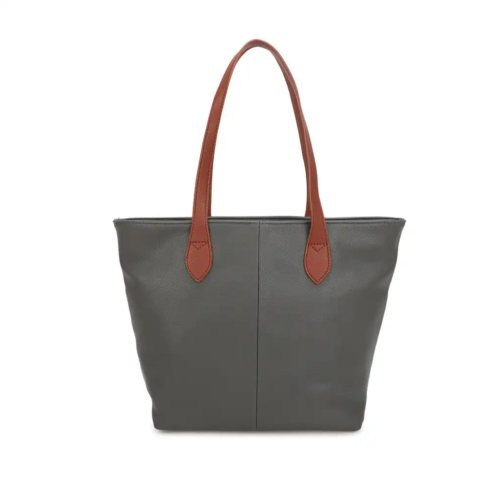 Grey tote bag with brown faux leather handles on a white background