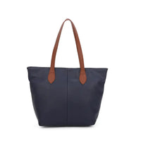 Navy tote bag with tan brown shoulder straps. On a white background.