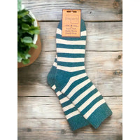 Forest green and off white striped socks with a larger toe and heel area in the green. Ribbed green ankle cuff.