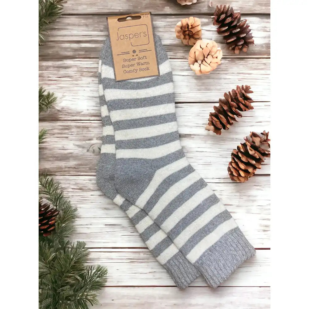 Grey and off white striped socks with a larger toe and heel area in the grey. Ribbed grey ankle cuff.