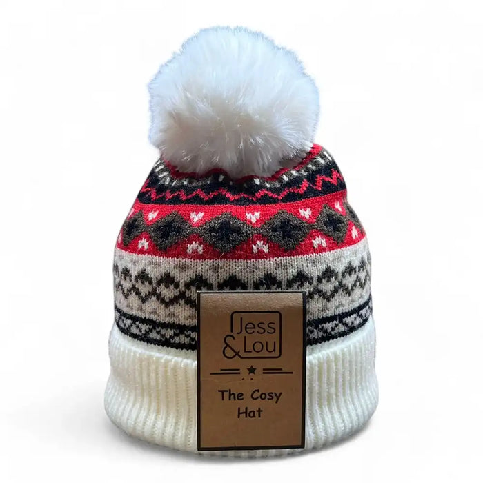 Knitted hat with a white pom-pom and red and black pattern, featuring a Jess & Lou label.